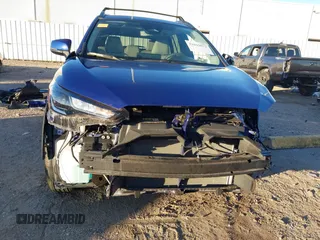 2024 Toyota Corolla Cross LE with VIN 7MUBAABG4RV092431, listed as a IAAI auction lot 41012071 with 4,641 mi miles and . Bid and sale history available at DreamBid. Image 6.