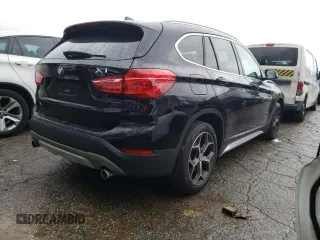2018 BMW X1 sDrive28i with VIN WBXHU7C37J5L05153, listed as a Copart auction lot 36528533 with 40,704 mi miles. Bid and sale history available at carsss.com. Image 3.