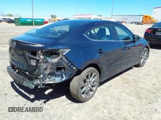 2018 Mazda 3 Touring with VIN 3MZBN1V36JM256934, listed as a IAAI auction lot 41828741 with 58,849 mi miles. Bid and sale history available at carsss.com. Image 4.