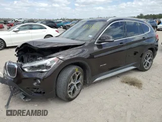 2017 BMW X1 xDrive28i with VIN WBXHT3C36H5F72244, listed as a Copart auction lot 49338815 with 79,351 mi miles and Salvage Title. Bid and sale history available at carsss.com. Image 1.