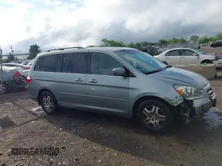 2007 Honda Odyssey EX-L z VIN 5FNRL38717B002725, wystawiony jako IAAI lot #42177209 z przebiegiem 226 706 mil mil oraz . Historia ofert i sprzedaży dostępna na DreamBid. Obrazek 13.