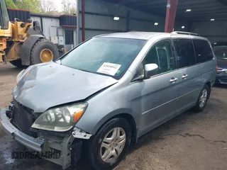 2006 Honda Odyssey EX with VIN 5FNRL38406B066176, listed as a IAAI auction lot 42028052 with 136,305 mi miles and . Bid and sale history available at DreamBid. Image 18.