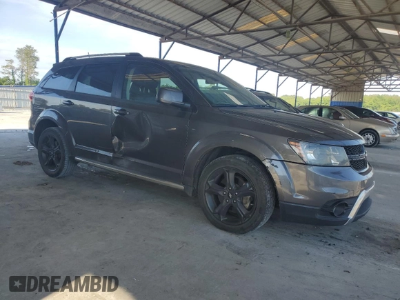 2019 Dodge Journey Crossroad z VIN 3C4PDCGG8KT717064, wystawiony jako Copart lot #55677305 z przebiegiem 115 493 mil mil oraz Szkoda całkowita • Salvage title. Historia ofert i sprzedaży dostępna na DreamBid. Obrazek 4.