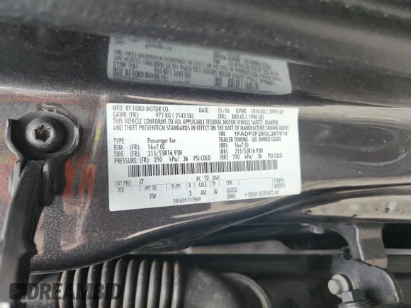 2016 Ford Focus SE z VIN 1FADP3F28GL267618, wystawiony jako Copart lot #58920765 z przebiegiem 157 980 mil mil oraz Szkoda całkowita • Salvage title. Historia ofert i sprzedaży dostępna na DreamBid. Obrazek 12.