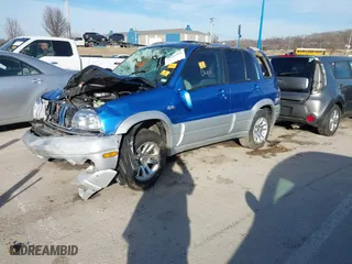 2004 Suzuki Grand Vitara LX with VIN JS3TD62V844103146, listed as a IAAI auction lot 41495991 with 1 mi miles. Bid and sale history available at carsss.com. Image 2.