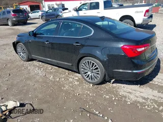 2014 Kia Cadenza Premium with VIN KNALN4D73E5140435, listed as a IAAI auction lot 41843037 with 126,555 mi miles and . Bid and sale history available at DreamBid. Image 3.