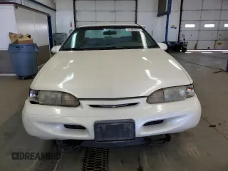 1995 Ford Thunderbird LX with VIN 1FALP62W9SH159185, listed as a Copart auction lot 51862975 with 128,230 mi miles and Clean Title. Bid and sale history available at carsss.com. Image 5.