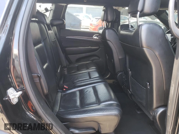 2019 Jeep Grand Cherokee Limited with VIN 1C4RJFBG5KC713902, listed as a Copart auction lot 57871925 with 119,778 mi miles and Salvage title. Bid and sale history available at DreamBid. Image 11.