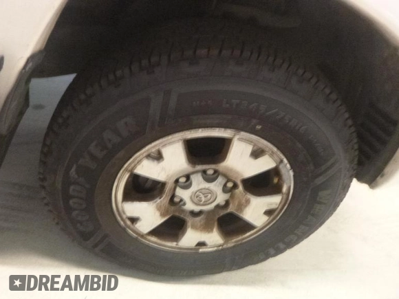 2013 Toyota Tacoma with VIN 3TMMU4FN6DM062201, listed as a IAAI auction lot 42906789 with 266,431 mi miles and . Bid and sale history available at DreamBid. Image 12.