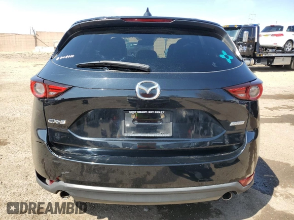 2018 Mazda CX-5 Grand Touring with VIN JM3KFADM9J1336792, listed as a Copart auction lot 52209435 with 107,852 mi miles and Salvage Title. Bid and sale history available at DreamBid. Image 6.