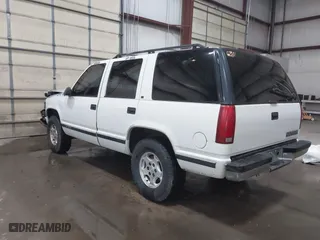 1996 Chevrolet Tahoe with VIN 1GNEK13R5TJ341299, listed as a IAAI auction lot 41713489 with 251,990 mi miles. Bid and sale history available at carsss.com. Image 3.