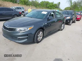 2016 Kia Optima LX with VIN KNAGT4L37G5073752, listed as a IAAI auction lot 42132621 with 136,818 mi miles. Bid and sale history available at carsss.com. Image 17.
