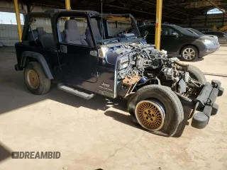 2005 Jeep Wrangler Unlimited с VIN 1J4FA44S65P376026, выставлен на аукционе Copart как лот 57692645 с пробегом Не указан миль и Чистый • Clean title. История ставок и продаж доступна на DreamBid. Изображение 4.