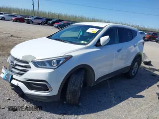 2017 Hyundai Santa Fe 2.4L z VIN 5NMZTDLB3HH003991, wystawiony jako IAAI lot #42051238 z przebiegiem 125 742 mil mil oraz . Historia ofert i sprzedaży dostępna na DreamBid. Obrazek 2.
