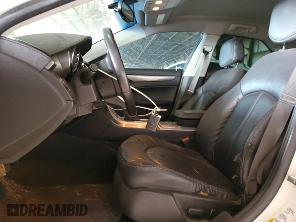 2012 Cadillac CTS with VIN 1G6DA5E52C0131731, listed as a Copart auction lot 59223235 with 104,521 mi miles and Salvage title. Bid and sale history available at DreamBid. Image 7.