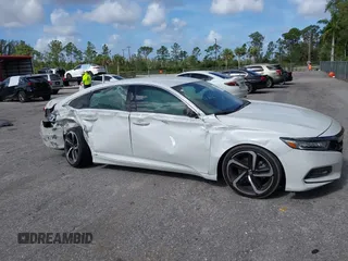 2019 Honda Accord Sport with VIN 1HGCV1F33KA113896, listed as a IAAI auction lot 41961776 with 92,248 mi miles and . Bid and sale history available at DreamBid. Image 6.
