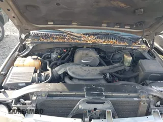 2001 Chevrolet Tahoe LS z VIN 1GNEC13T51R154488, wystawiony jako IAAI lot #41519004 z przebiegiem 400 208 mil mil oraz . Historia ofert i sprzedaży dostępna na DreamBid. Obrazek 10.