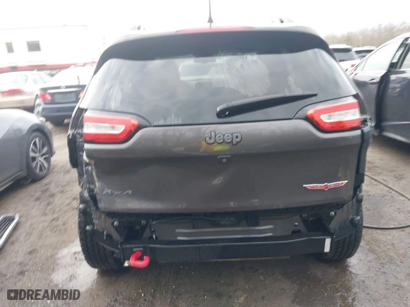 2018 Jeep Cherokee Trailhawk with VIN 1C4PJMBB3JD516090, listed as a IAAI auction lot 41460960 with 97,639 mi miles. Bid and sale history available at carsss.com. Image 16.