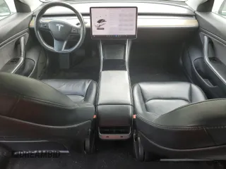 2018 Tesla Model 3 Long Range Battery with VIN 5YJ3E1EAXJF165000, listed as a Copart auction lot 53806195 with 140,448 mi miles and Clean Title. Bid and sale history available at DreamBid. Image 8.
