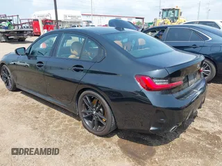 2023 BMW 3 Series 330i with VIN 3MW69FF09P8D39007, listed as a IAAI auction lot 42071643 with 24,781 mi miles and . Bid and sale history available at DreamBid. Image 3.