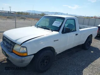 1999 Ford Ranger XL with VIN 1FTYR10C0XUA36539, listed as a IAAI auction lot 41865437 with 246,810 mi miles. Bid and sale history available at carsss.com. Image 2.