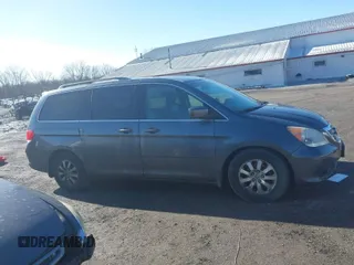 2010 Honda Odyssey EX-L with VIN 5FNRL3H68AB038541, listed as a IAAI auction lot 41813473 with 206,914 mi miles. Bid and sale history available at carsss.com. Image 1.