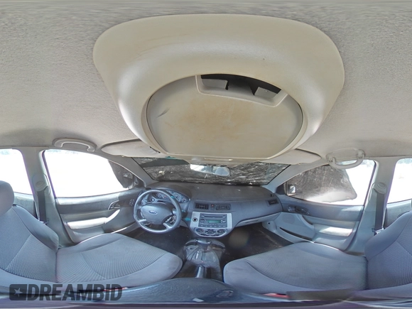 2006 Ford Focus S with VIN 1FAHP37N76W180039, listed as a Copart auction lot 58328565 with 220,696 mi miles and Salvage title. Bid and sale history available at DreamBid. Image 16.