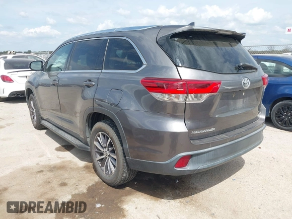 2018 Toyota Highlander SE with VIN 5TDKZRFH9JS544012, listed as a IAAI auction lot 41885296 with 144,500 mi miles and . Bid and sale history available at DreamBid. Image 3.