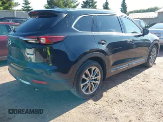 2018 Mazda CX-9 Grand Touring with VIN JM3TCBDYXJ0208962, listed as a IAAI auction lot 42629720 with 123,929 mi miles and . Bid and sale history available at DreamBid. Image 4.