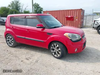 2013 Kia Soul + with VIN KNDJT2A64D7535971, listed as a IAAI auction lot 39721869 with 119,184 mi miles. Bid and sale history available at carsss.com. Image 1.