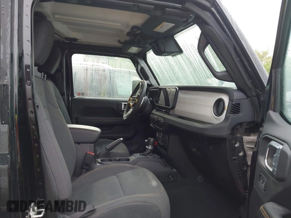2024 Jeep Wrangler Sahara with VIN 1C4RJXP67RW274877, listed as a IAAI auction lot 42119319 with 7,157 mi miles and . Bid and sale history available at DreamBid. Image 5.