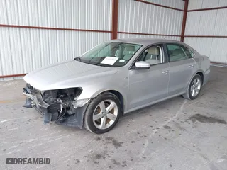 2014 Volkswagen Passat Wolfsburg Ed with VIN 1VWAS7A32EC036193, listed as a IAAI auction lot 41606595 with 77,536 mi miles. Bid and sale history available at carsss.com. Image 2.