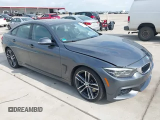 2019 BMW 4 Series 440i with VIN WBA4J5C54KBM65694, listed as a IAAI auction lot 42124257 with 94,977 mi miles and . Bid and sale history available at DreamBid. Image 1.