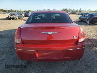2010 Chrysler 300 with VIN 2C3CA2CVXAH330680, listed as a Copart auction lot 71732154 with 169,895 mi miles and Salvage Title. Bid and sale history available at carsss.com. Image 6.
