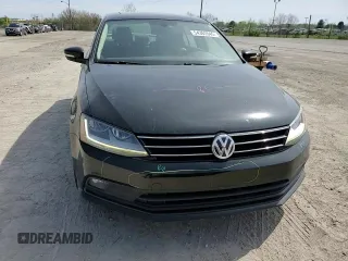2017 Volkswagen Jetta SEL z VIN 3VWL17AJ4HM263303, wystawiony jako Copart lot #54363545 z przebiegiem 103 597 mil mil oraz Szkoda całkowita • Salvage title. Historia ofert i sprzedaży dostępna na DreamBid. Obrazek 13.