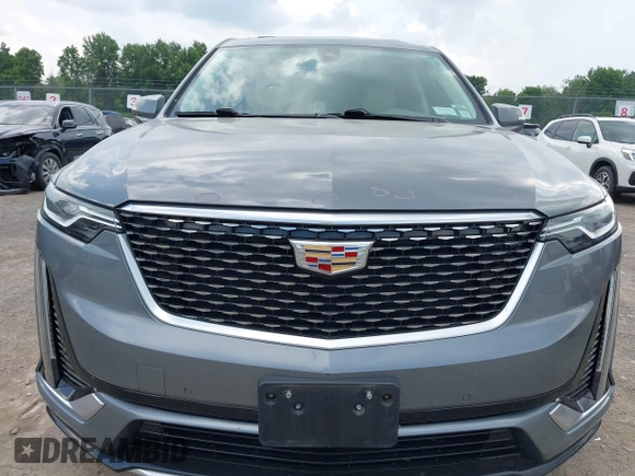 2021 Cadillac XT6 Premium Luxury with VIN 1GYKPDRS9MZ118642, listed as a IAAI auction lot 42664965 with 65,566 mi miles and . Bid and sale history available at DreamBid. Image 12.
