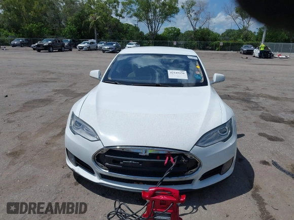2013 Tesla Model S с VIN 5YJSA1AC8DFP10260, выставлен на аукционе IAAI как лот 42545156 с пробегом 121 329 миль миль и . История ставок и продаж доступна на DreamBid. Изображение 12.