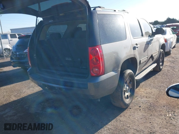 2012 GMC Yukon SLE with VIN 1GKS1AE06CR218372, listed as a IAAI auction lot 41591288 with 166,596 mi miles. Bid and sale history available at carsss.com. Image 4.