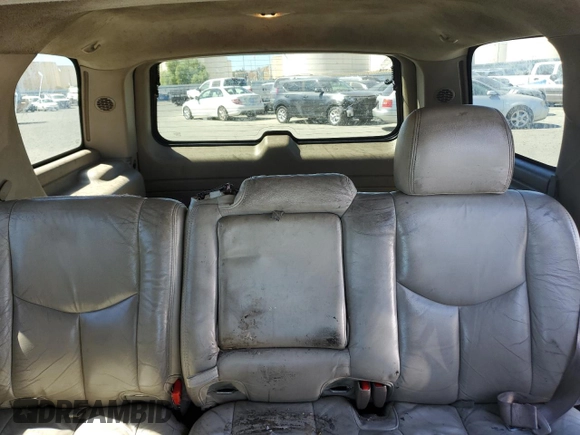 2004 GMC Yukon SLE with VIN 1GKEK13T54J168734, listed as a Copart auction lot 71235204 with 174,429 mi miles and Salvage Title. Bid and sale history available at carsss.com. Image 10.