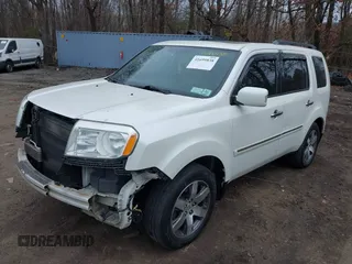 2013 Honda Pilot Touring with VIN 5FNYF4H96DB031577, listed as a IAAI auction lot 41699838 with 180,876 mi miles. Bid and sale history available at carsss.com. Image 18.
