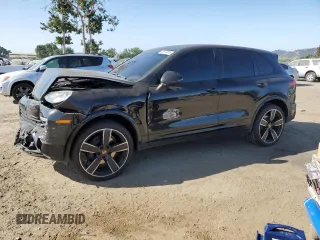 2017 Porsche Cayenne with VIN WP1AA2A25HKA89656, listed as a Copart auction lot 60673255 with 119,563 mi miles and Salvage title. Bid and sale history available at DreamBid. Image 1.