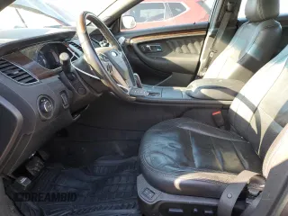 2014 Ford Taurus Limited with VIN 1FAHP2F8XEG163430, listed as a Copart auction lot 55357205 with 150,841 mi miles and Salvage title. Bid and sale history available at DreamBid. Image 7.