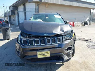 2018 Jeep Compass Altitude with VIN 3C4NJDBB6JT239565, listed as a IAAI auction lot 42219401 with 85,013 mi miles and . Bid and sale history available at DreamBid. Image 12.