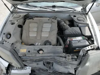 2006 Hyundai Tiburon GT z VIN KMHHN65F06U203701, wystawiony jako Copart lot #52374135 z przebiegiem 90 796 mil mil oraz Szkody całkowita. Historia ofert i sprzedaży dostępna na DreamBid. Obrazek 11.