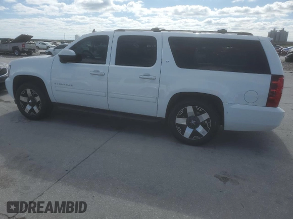 2013 Chevrolet Suburban LT with VIN 1GNSCJE01DR227690, listed as a Copart auction lot 48963485 with 184,298 mi miles and Salvage Title. Bid and sale history available at carsss.com. Image 2.