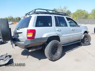 2004 Jeep Grand Cherokee Limited with VIN 1J8GW58N44C390592, listed as a IAAI auction lot 42150161 with Not provided miles and . Bid and sale history available at DreamBid. Image 4.