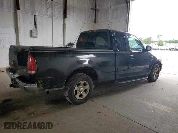 1999 Ford F-150 with VIN 1FTZX1723XNA24144, listed as a Copart auction lot 58071155 with 320,829 mi miles and Salvage title. Bid and sale history available at DreamBid. Image 3.