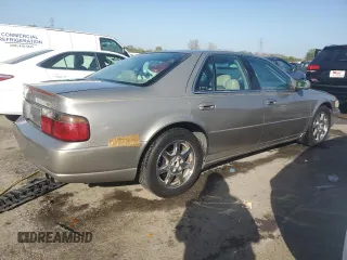 2003 Cadillac Seville Touring STS z VIN 1G6KY54943U118351, wystawiony jako Copart lot #74207414 z przebiegiem 55 204 mil mil oraz Szkoda całkowita • Salvage title. Historia ofert i sprzedaży dostępna na DreamBid. Obrazek 3.