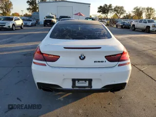 2013 BMW 6 Series 650i with VIN WBAYM9C59DDW20361, listed as a Copart auction lot 79741594 with 86,948 mi miles and Clean Title. Bid and sale history available at carsss.com. Image 6.