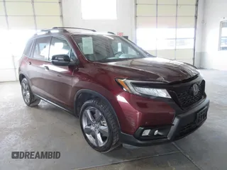 2020 Honda Passport Touring z VIN 5FNYF8H9XLB002041, wystawiony jako Copart lot #78496434 z przebiegiem 39 475 mil mil oraz Szkoda całkowita • Salvage title. Historia ofert i sprzedaży dostępna na DreamBid. Obrazek 1.